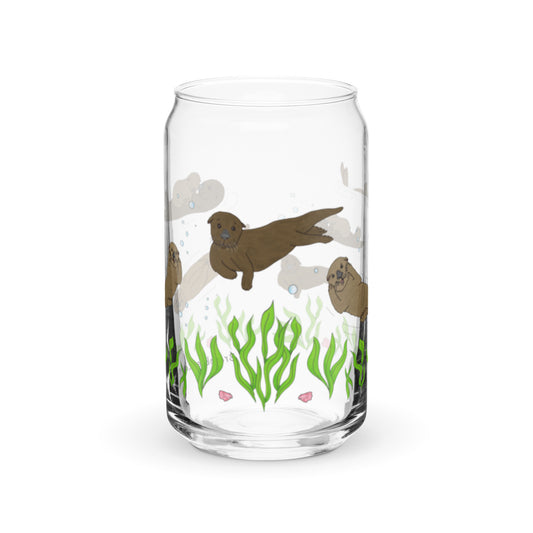 Can-shaped glass holds 16 fluid ounces. Has a design of sea otters swimming above the seaweed with bubble and shell accents.