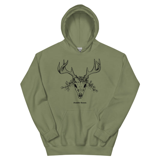 Military green colored unisex heavy blend hoodie. Design features a deer skull wreathed in flowers. Features a double lined hood and front pouch pocket.