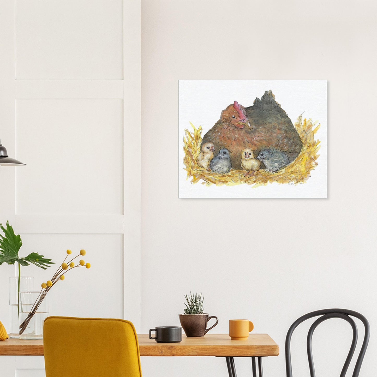 24 by 30 inch slim canvas Mother Hen print. Features a watercolor mother hen and her four chicks in a nest. Shown on wall above kitchen table and chairs.
