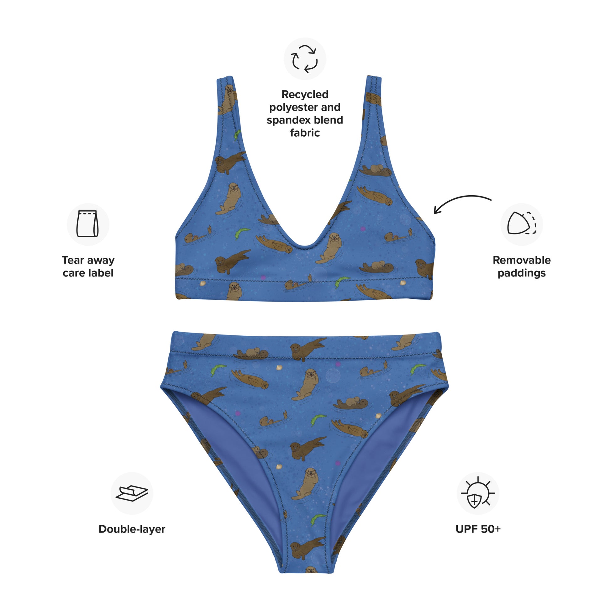 High-waisted bikini with hand-illustrated sea otters patterned on an ocean blue background. Made from recycled polyester combined with stretchable fabric. Has double layers and removable pads.