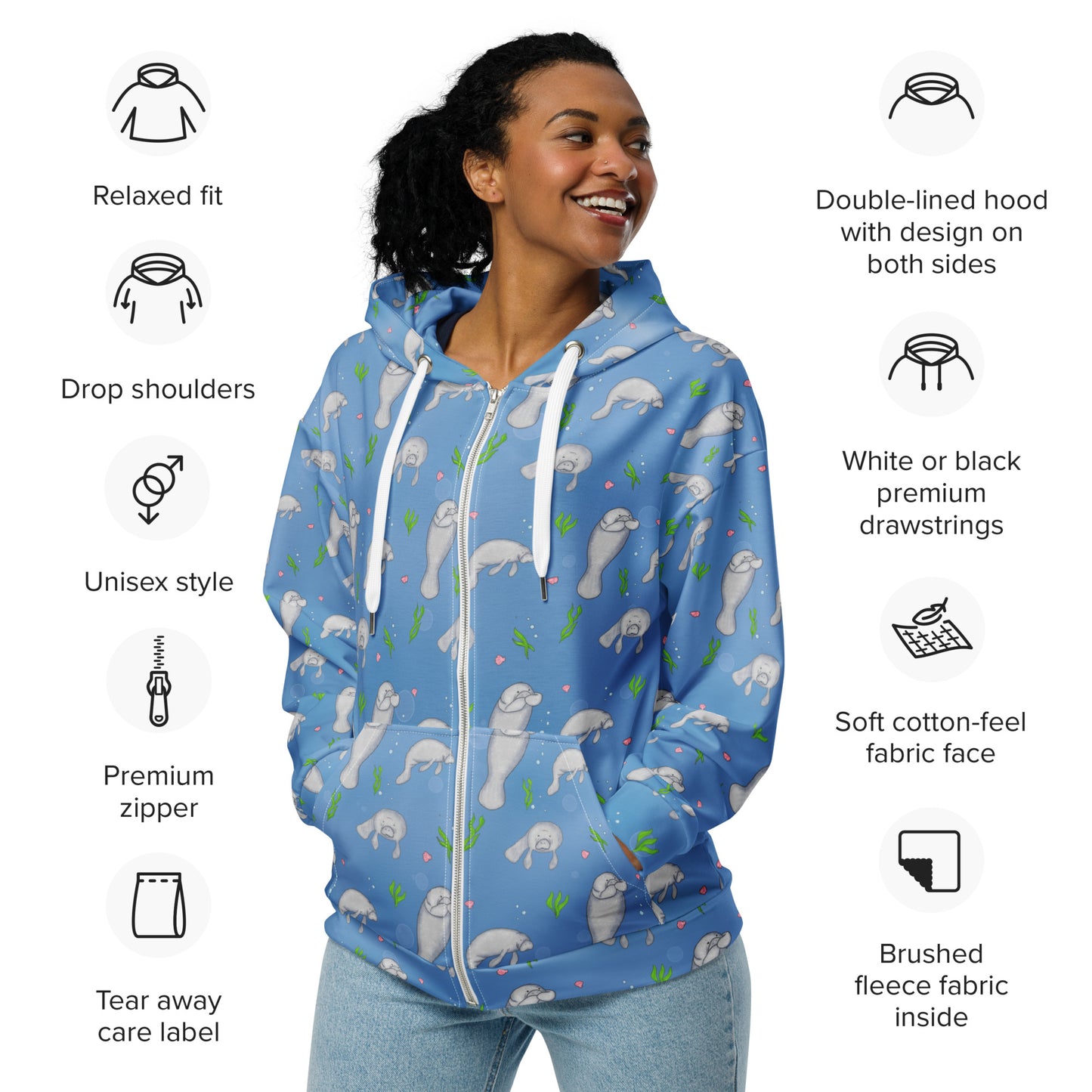 Unisex patterned manatee zip up hoodie. Made with recycled polyester. Soft cotton-feel outside fabric and fleece inside. Metal zipper, eyelets, and drawcord tips. Shown on female model.