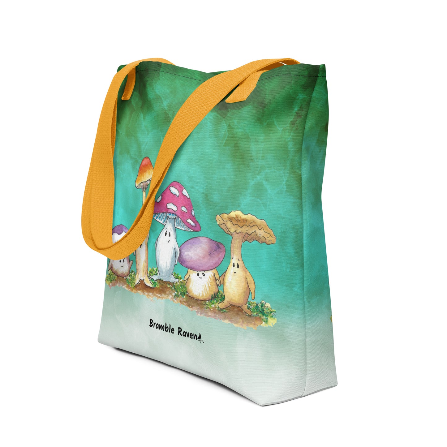 15 by 15 inch sturdy tote bag. Features Mushy and his whimsical mushroom friends on a green gradient background. Made of spun polyester with yellow cotton bull denim handles. Shown sitting on tabletop.