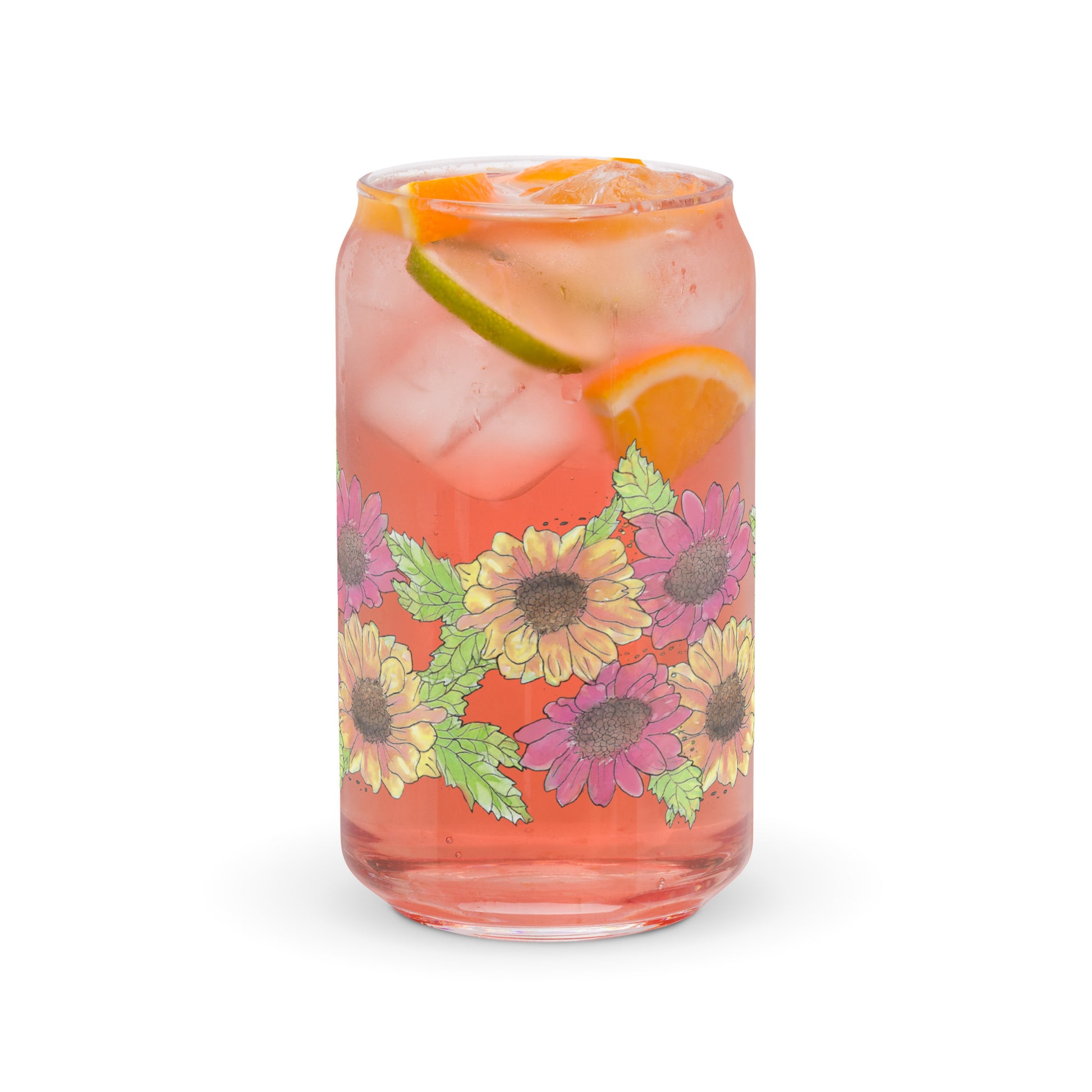 16 ounce can-shaped glass. Features wraparound print of watercolor Gerber daisies. Shown filled with pink lemonade and citrus wedges.