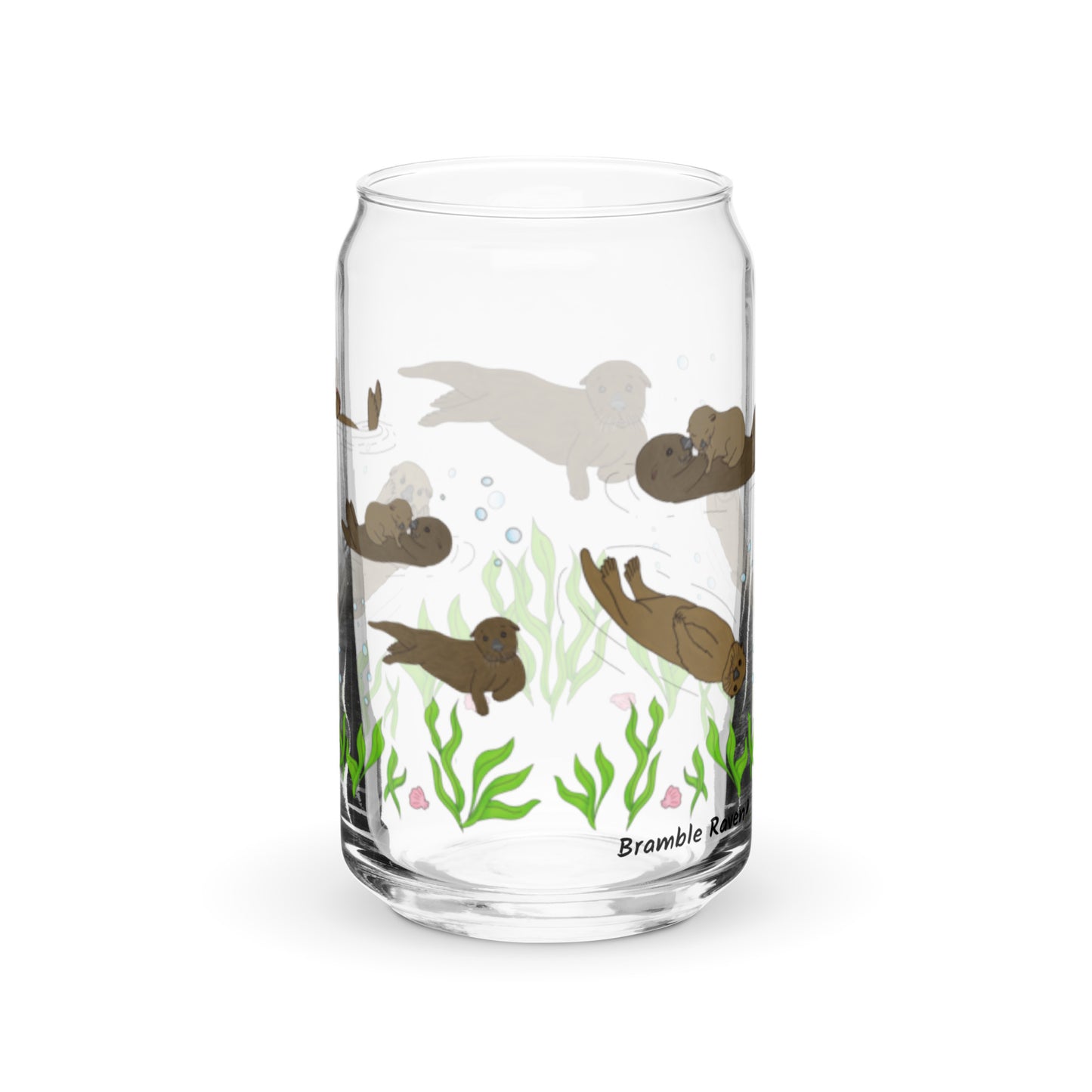 Can-shaped glass holds 16 fluid ounces. Has a design of sea otters swimming above the seaweed with bubble and shell accents.