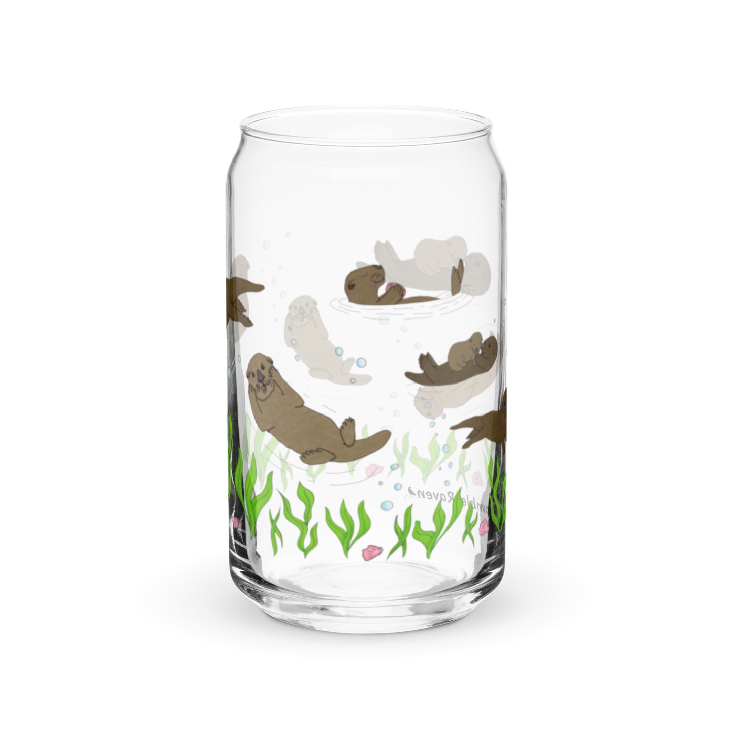 Can-shaped glass holds 16 fluid ounces. Has a design of sea otters swimming above the seaweed with bubble and shell accents. Left side view.