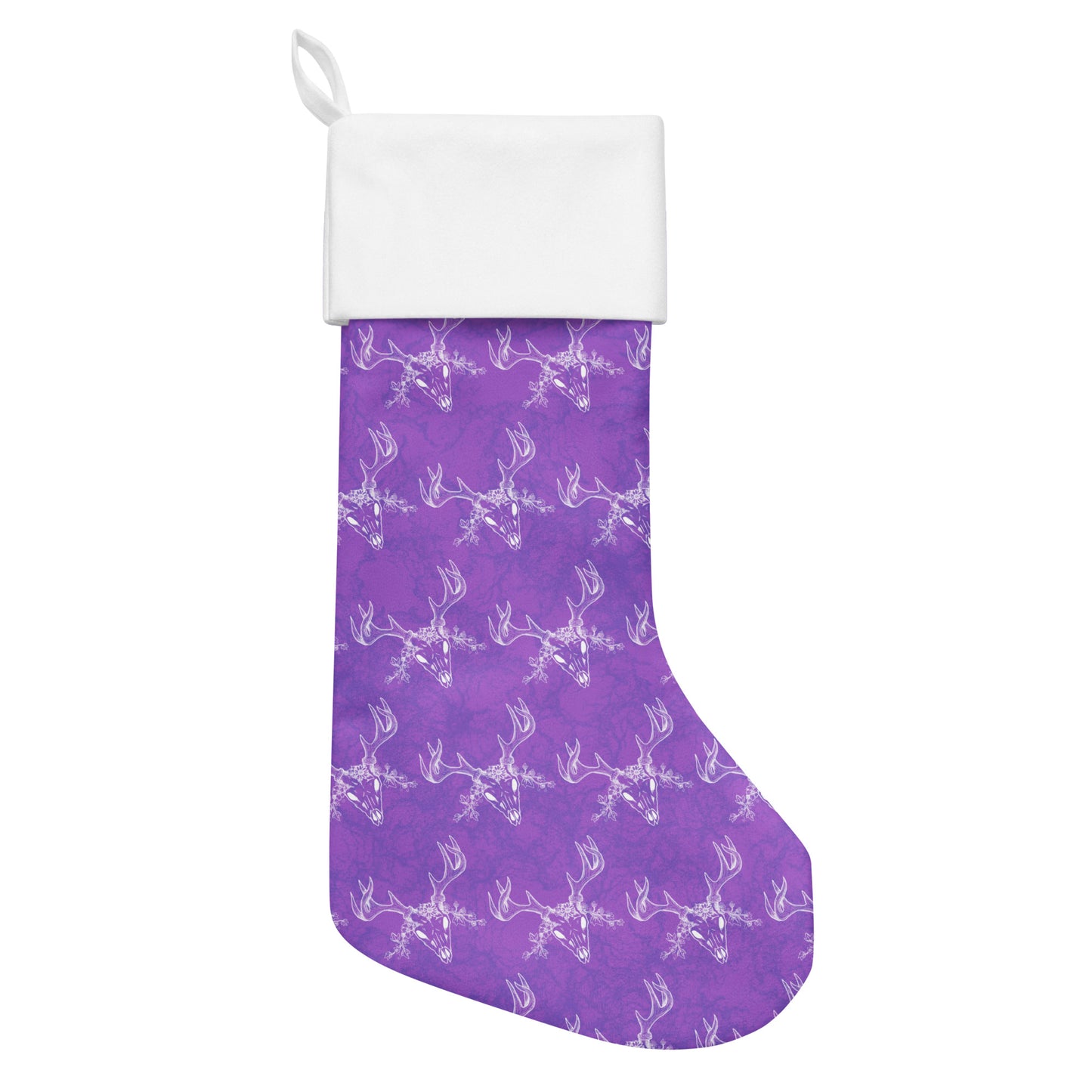 Limited Edition Purple Deer Skull Christmas Stocking.  7 by 18 inches. The front has a hand-illustrated deer skull design on a purple background with an off-white polyester fabric on the back. It has a white fold-over cuff and a loop for hanging. Flat lay view.