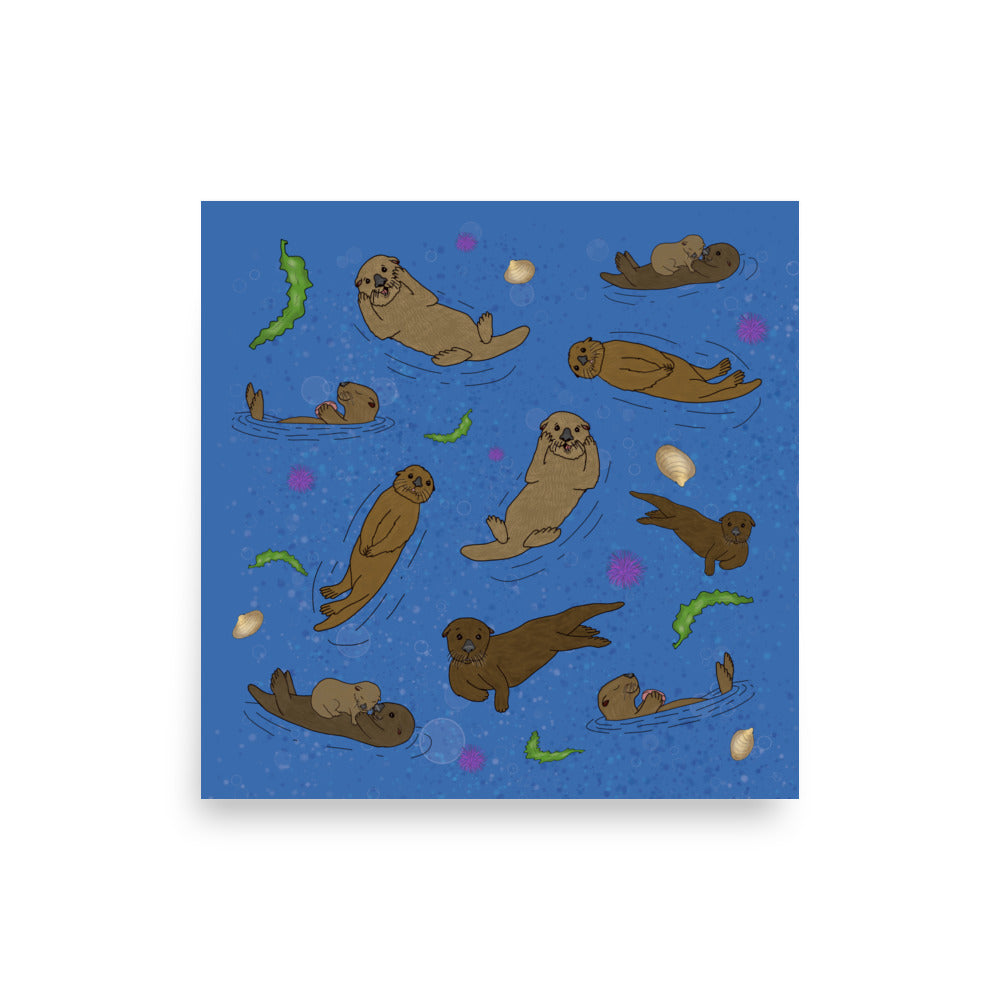 18 x 18 inch matte poster art print. Hand illustrated digital drawing of cute sea otters with accenting seashells, seaweed, and sea urchins on a blue background.