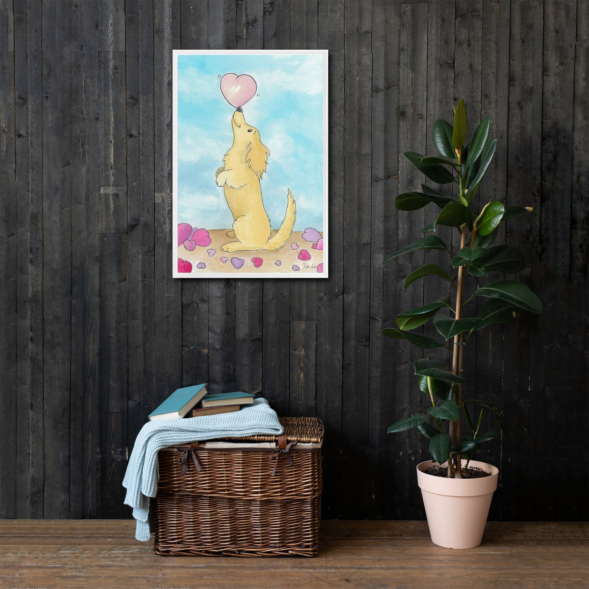 20 by 30 inch framed canvas Puppy Love print. The canvas is in a white pine wood frame. Shown on dark wood wall above wicker basket and potted plant.