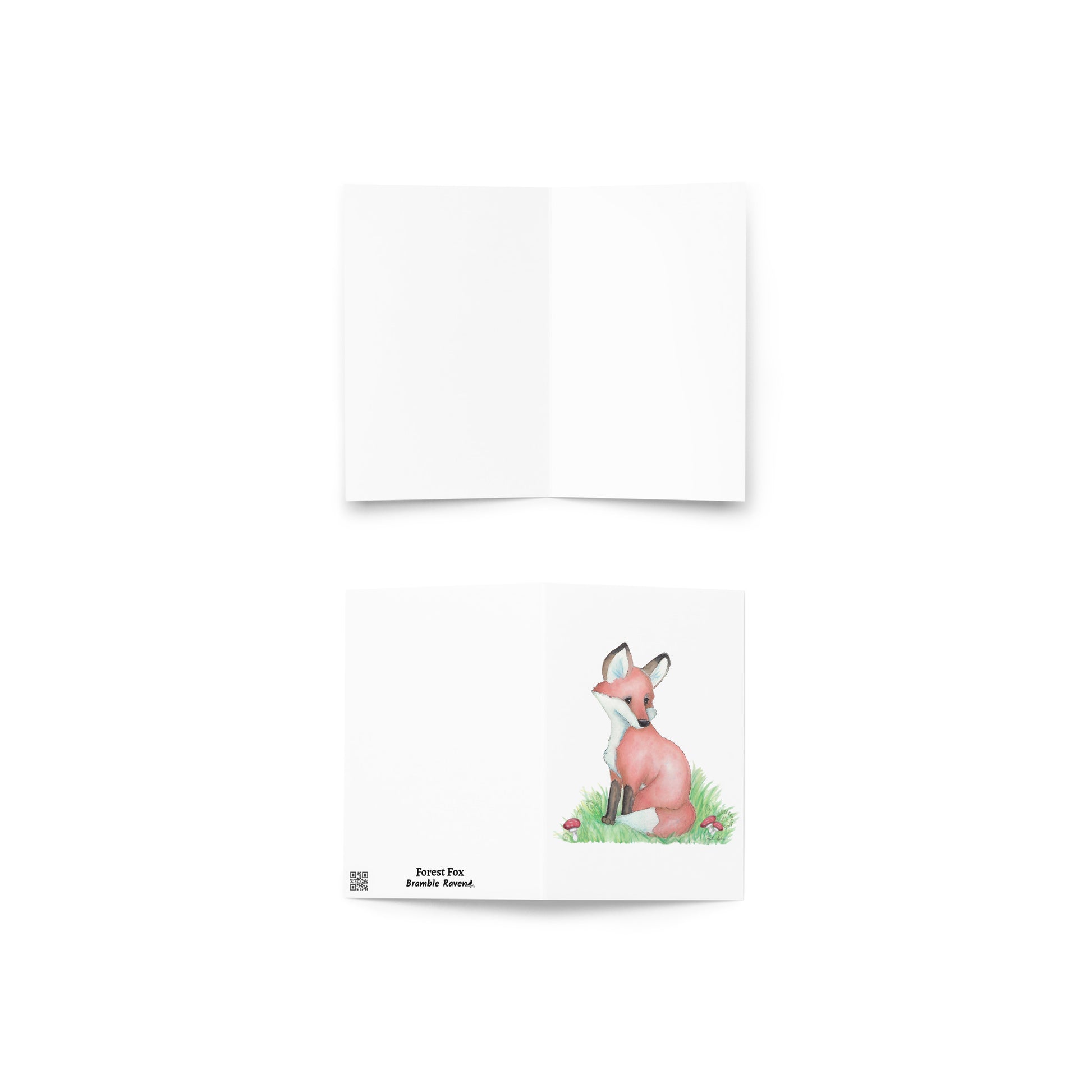 4 by 6 inch forest fox greeting card. Front has watercolor print of a fox in the grass by mushrooms and ferns. Inside is blank. Comes with a white envelope. Made of durable paperboard with vibrant printing. Shows front and back cover, and blank inside.