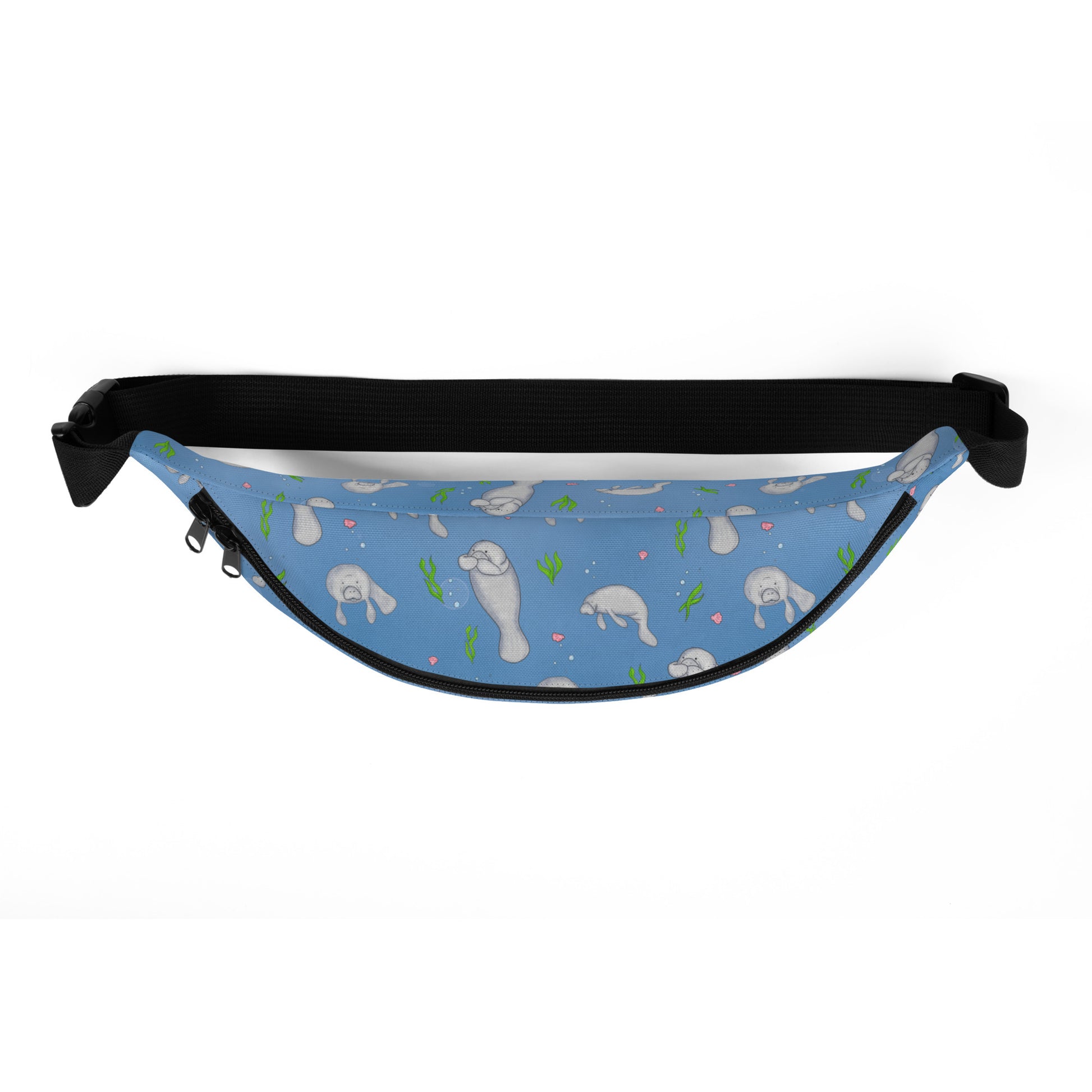 Cute manatee patterned belt bag with adjustable straps, zippered pouch, and small inner pocket. Top view of bag.