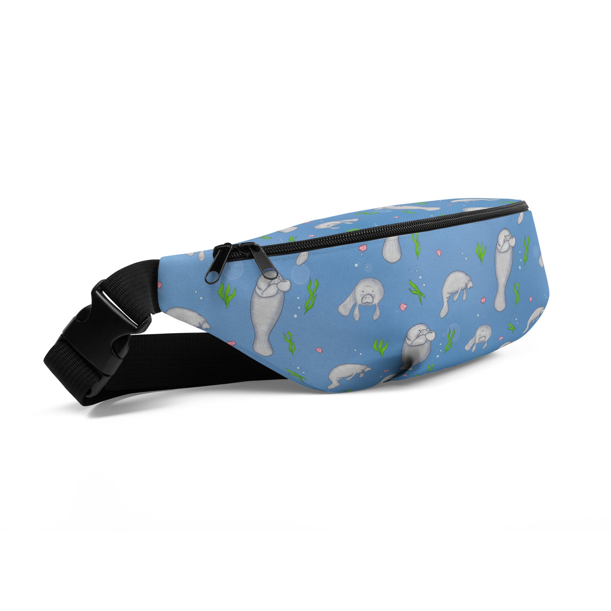 Cute manatee patterned belt bag with adjustable straps, zippered pouch, and small inner pocket.
