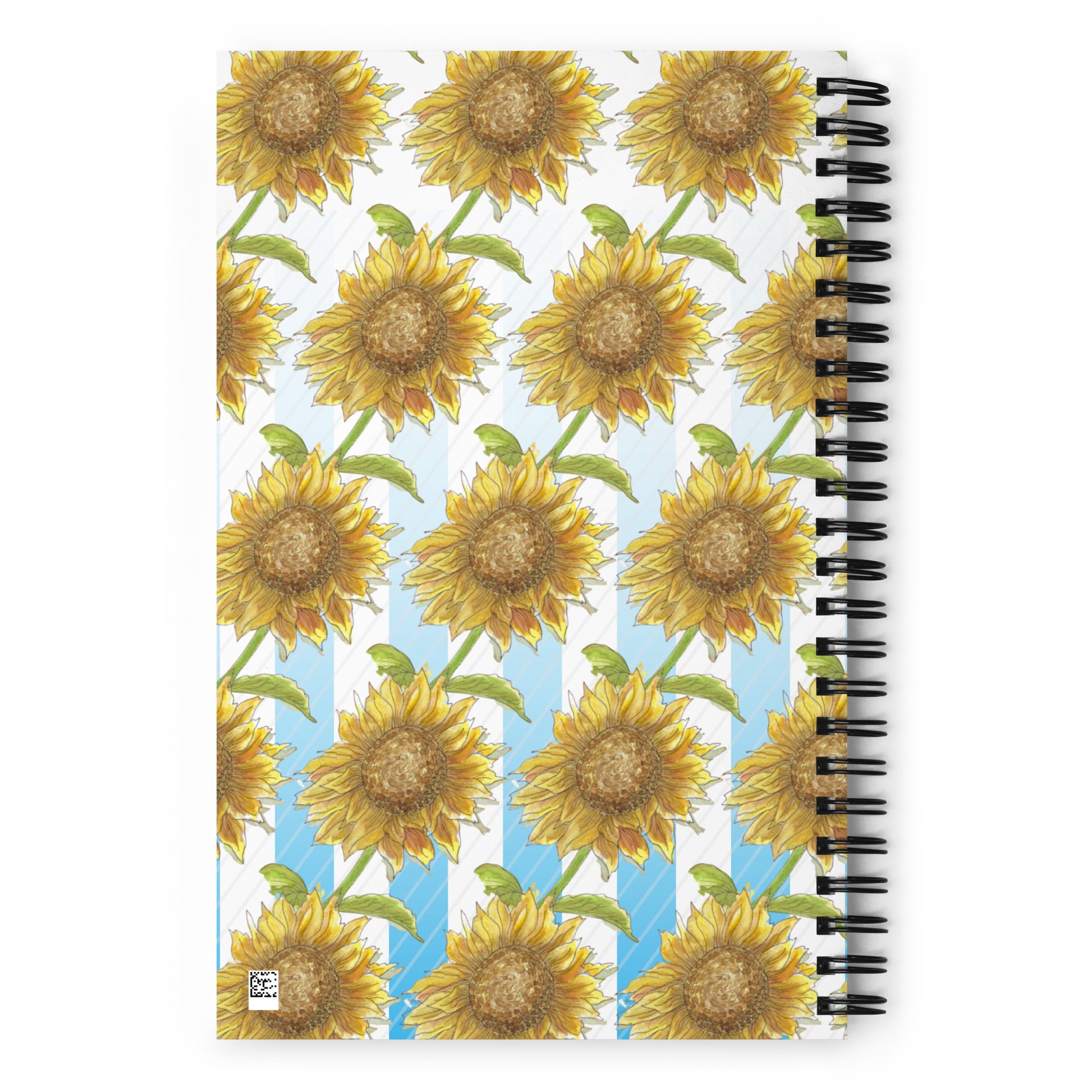 Spiral bound notebook with soft touch cover and 140 dotted pages. Cover features a pattern of watercolor sunflowers and blue and white stripes. Front has inspirational phrase "find your sunshine." Measures 5.5 inches by 8.5 inches. Image shows back of notebook.