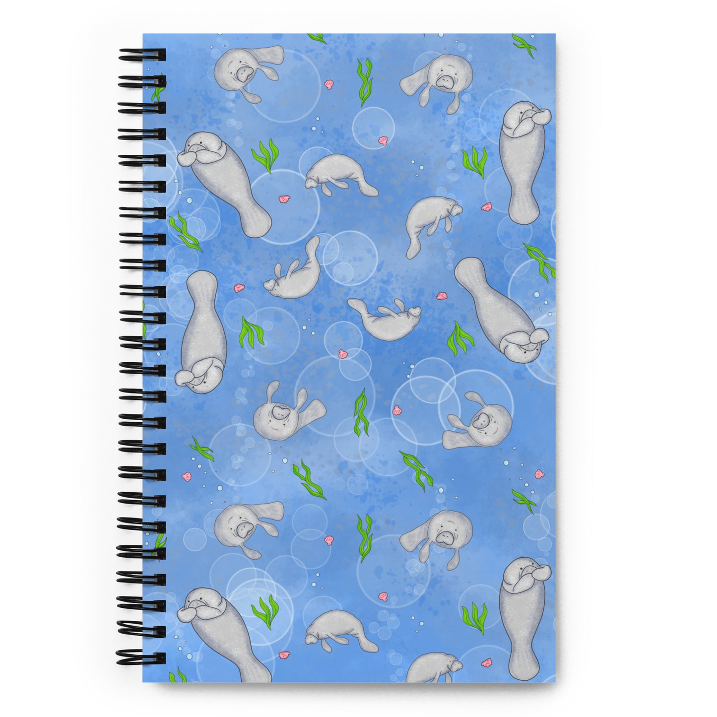 Spiral bound notebook with soft touch cover and 140 dotted pages. Cover features cute illustrated manatees swimming in the water. Measures 5.5 inches by 8.5 inches.