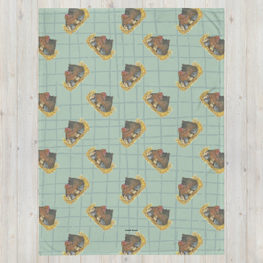 60 by 80 inch polyester throw blanket. Top features a patterned print of a watercolor mother hen and her chicks on a green crosshatched background. Underside is white. 