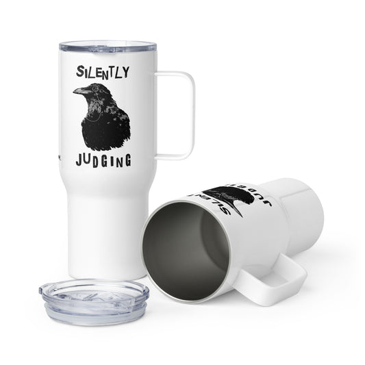 Stainless steel travel mug with handle. Holds 25 ounces of hot or cold liquids. Fits most car cup holders. Features double-sided image of monocled silently judging crow. Comes with spill proof plastic lid.