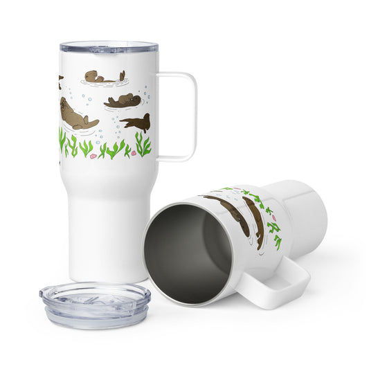 Stainless steel travel mug with handle. Holds 25 ounces of hot or cold drinks. Has wraparound illustrated sea otters and plants. Fits most car cup holders. Comes with spill-proof BPA-free plastic lid. Image shows two travel mugs.