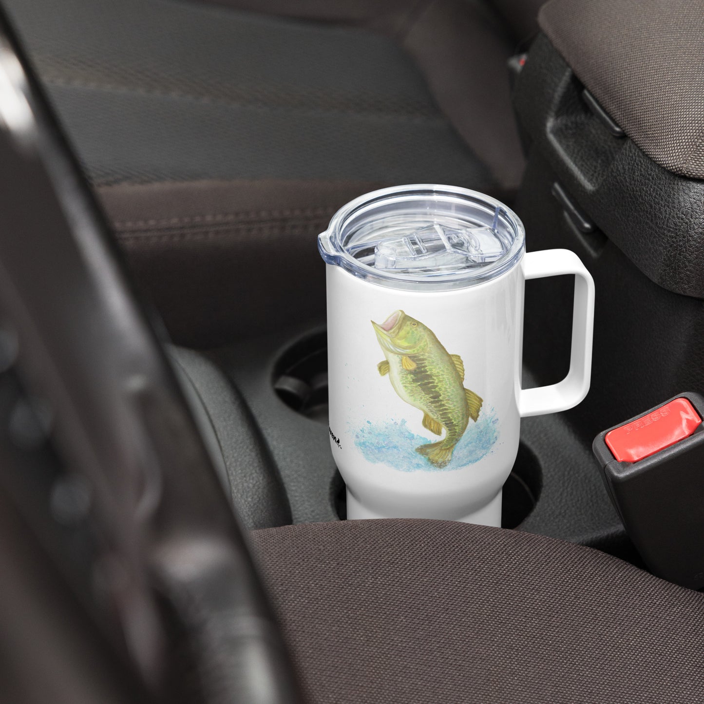 Stainless steel travel mug with handle. Holds 25 ounces of hot or cold drinks. Has print of watercolor bass fish on both sides. Fits most car cup holders. Comes with spill-proof BPA-free plastic lid. Shown in car cup holder.