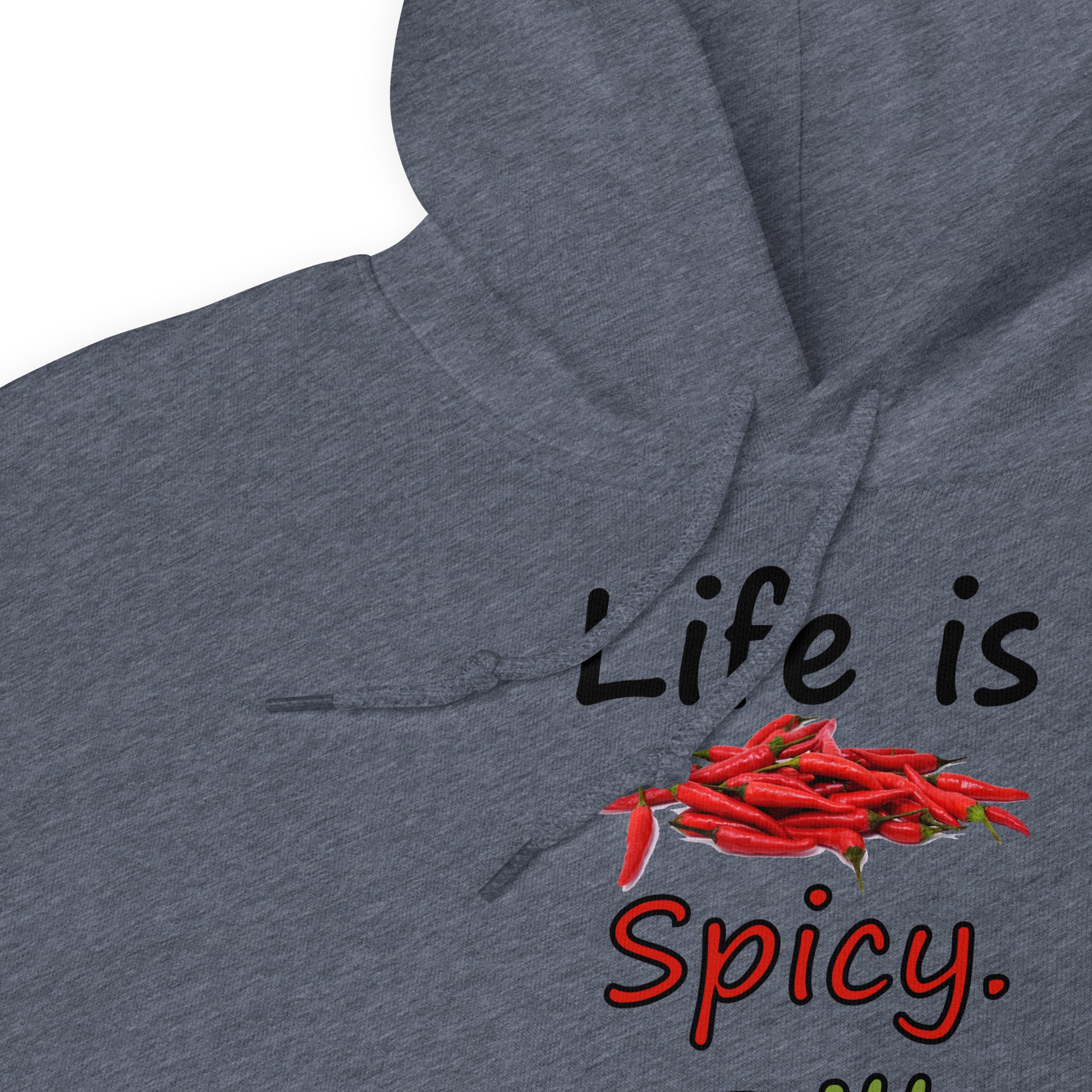 Heather dark grey colored unisex heavy blend hoodie.  Double lined hood, matching drawcord, front pouch pocket. Rib knit cuffs and waistband. Features text and image: Life is spicy. Dill with it.  Detail view of hood and drawcord.