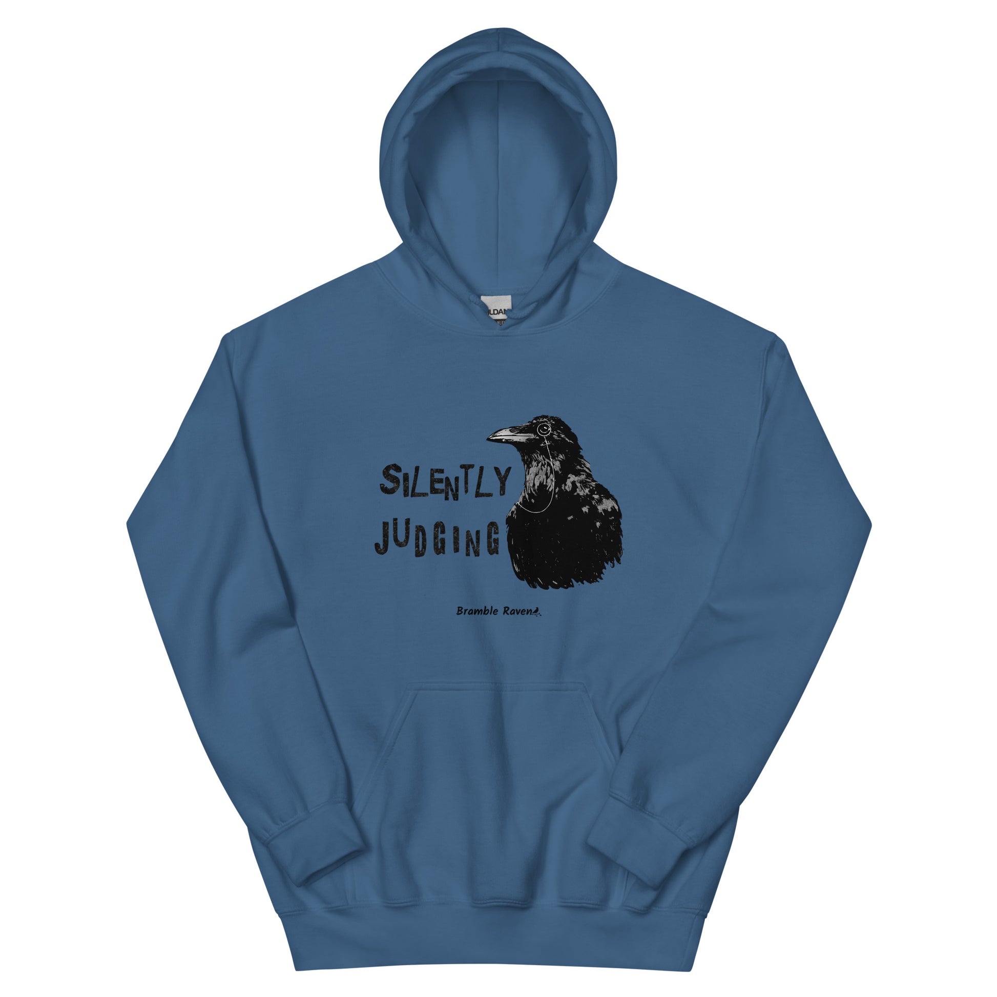 Unisex indigo blue colored hoodie with horizontal design of silently judging text by black crow wearing a monocle.  Design on the front of hoodie. Features double-lined hood and front pouch pocket.