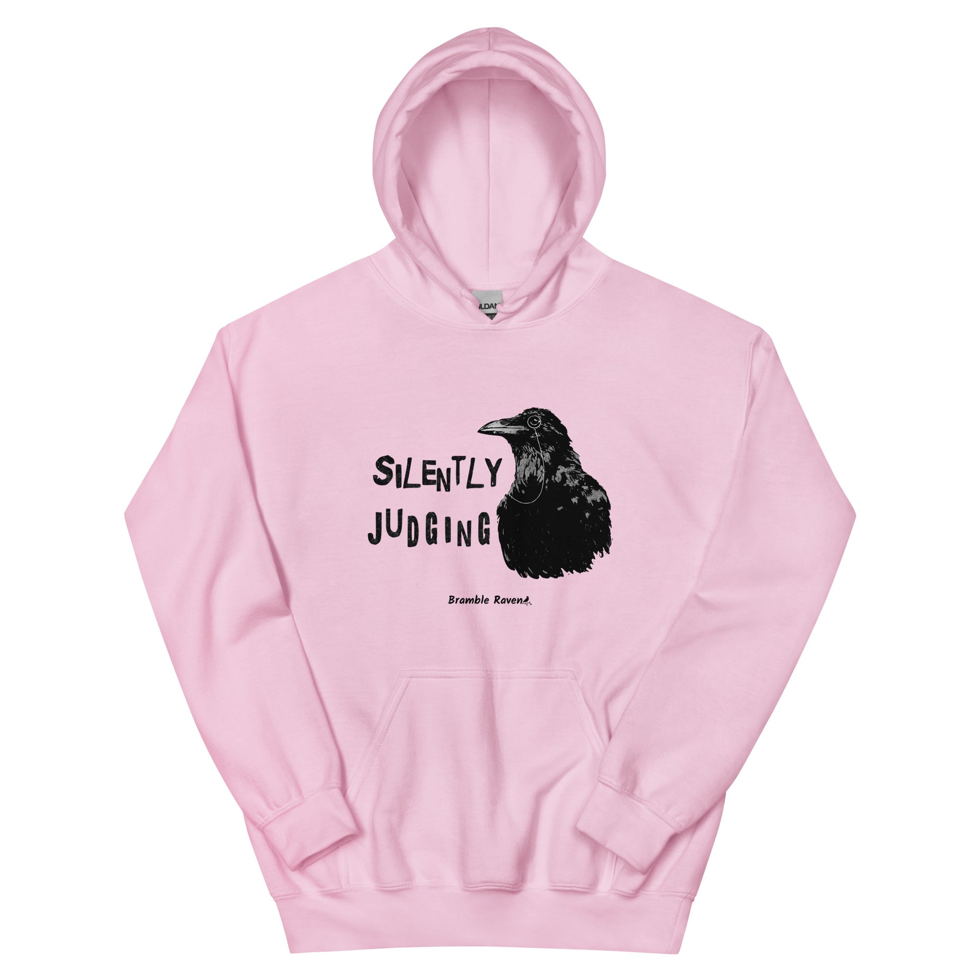 Unisex light pink colored hoodie with horizontal design of silently judging text by black crow wearing a monocle.  Design on the front of hoodie. Features double-lined hood and front pouch pocket.