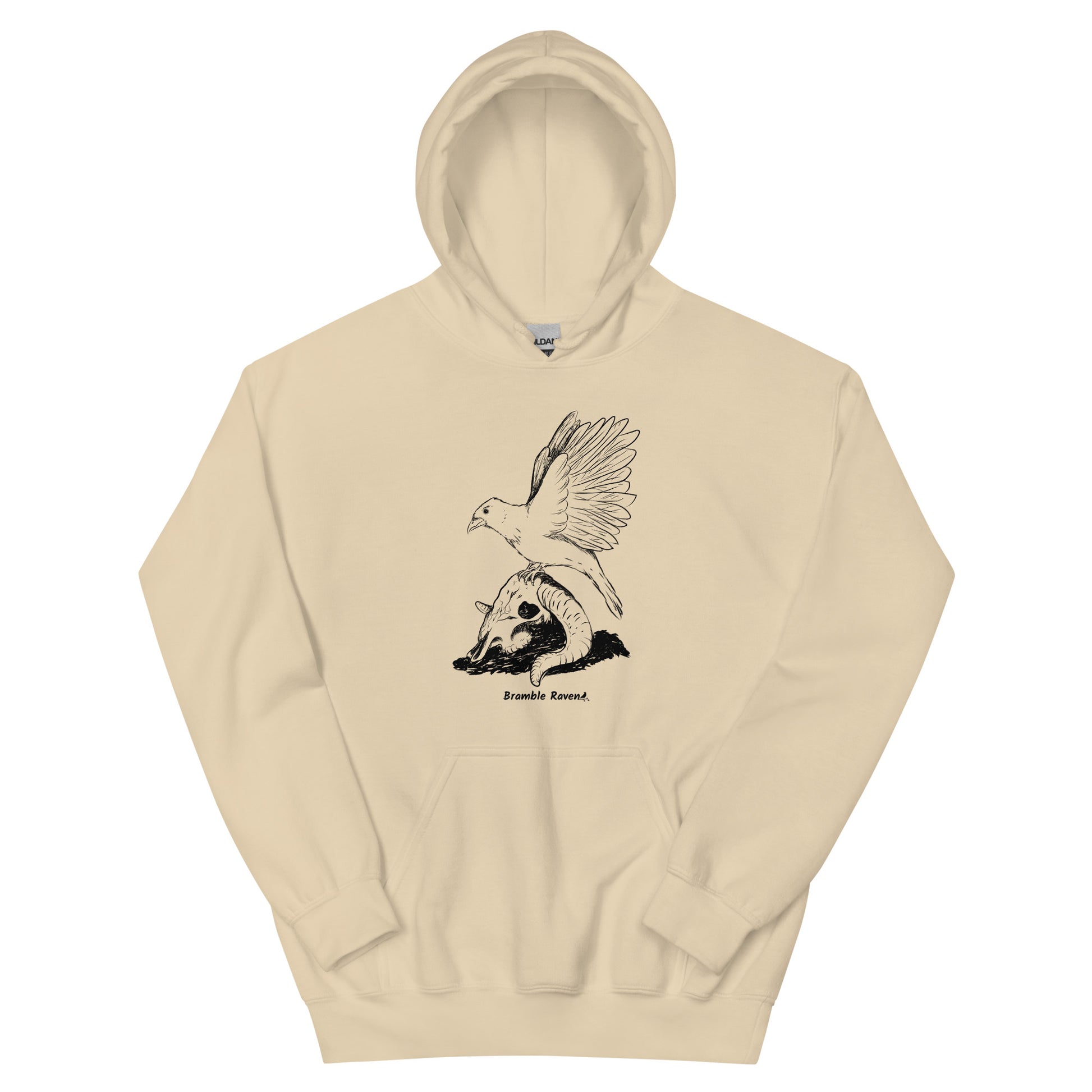 Sand colored unisex Reflections hoodie. Features image of a crow with wings outstretched sitting on a sheep skull.  Has a front pouch pocket and double lined hood.