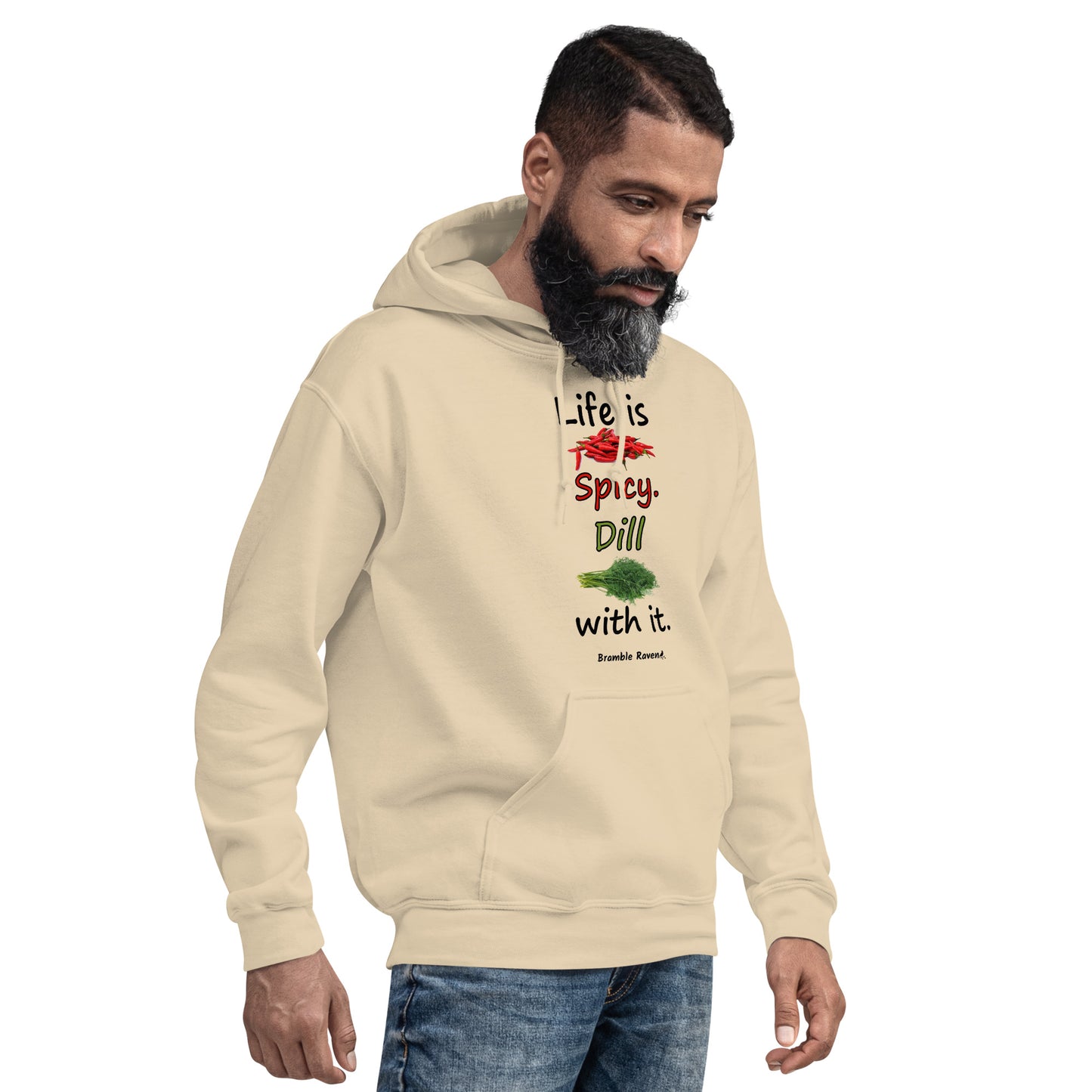 Sand colored unisex heavy blend hoodie.  Double lined hood, matching drawcord, front pouch pocket. Rib knit cuffs and waistband. Features text and image: Life is spicy. Dill with it.  Shown on male model facing right.