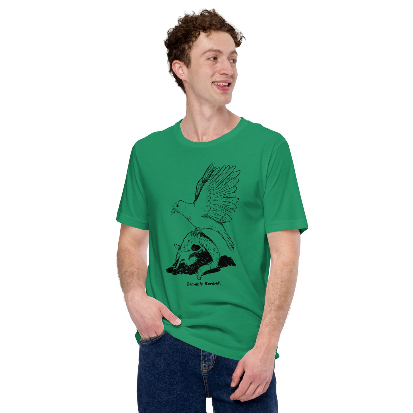 Kelly green colored unisex t-shirt. Features Reflections illustration of a crow with wings outstretched sitting on a sheep skull. Shown on male model.