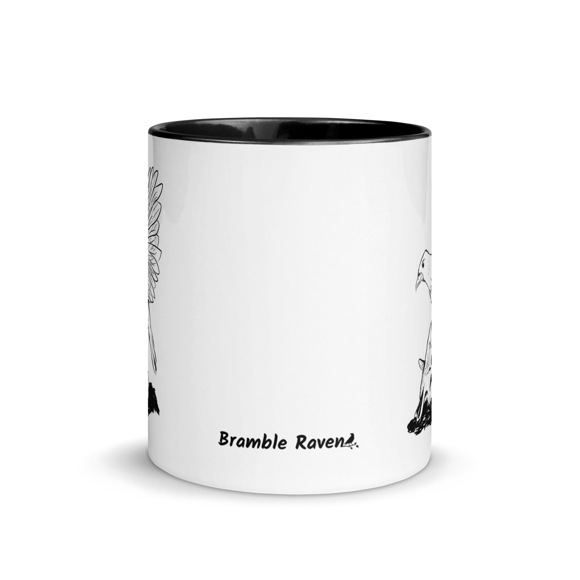 11 ounce white ceramic mug with black handle and inside. Features a double sided print of Reflections, a design with a crow sitting on a sheep skull. Dishwasher and microwave safe. Front view.