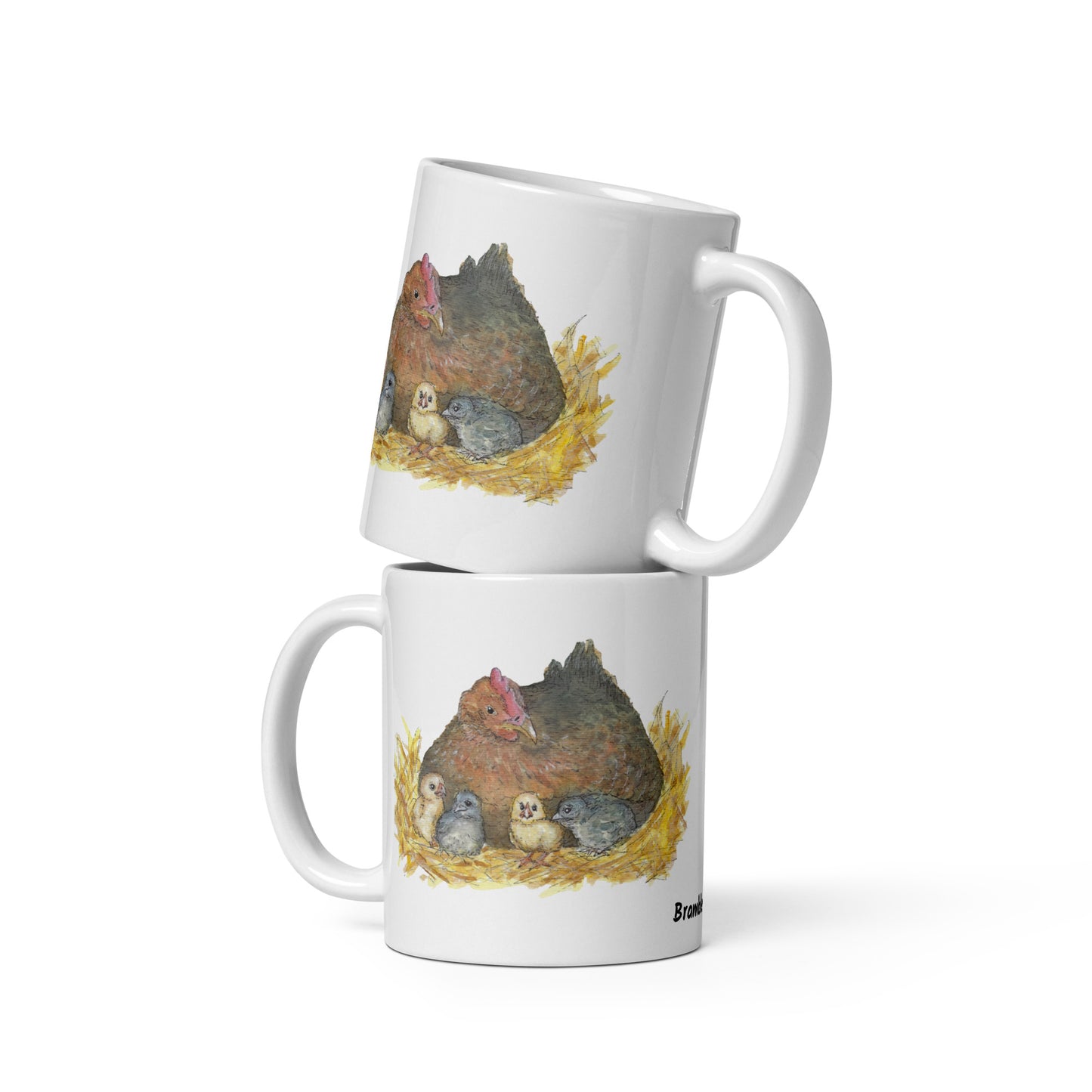11 ounce white ceramic mug. Features double-sided print of a watercolor mother hen and chicks. Dishwasher and microwave safe.