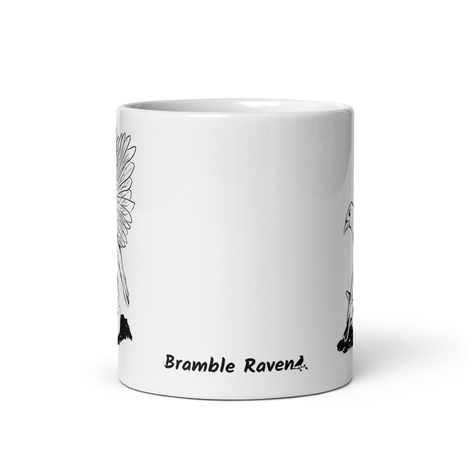 11 ounce white glossy mug featuring double sided print of Reflections, a design with a crow with wings outstretched on a sheep skull. Front view.
