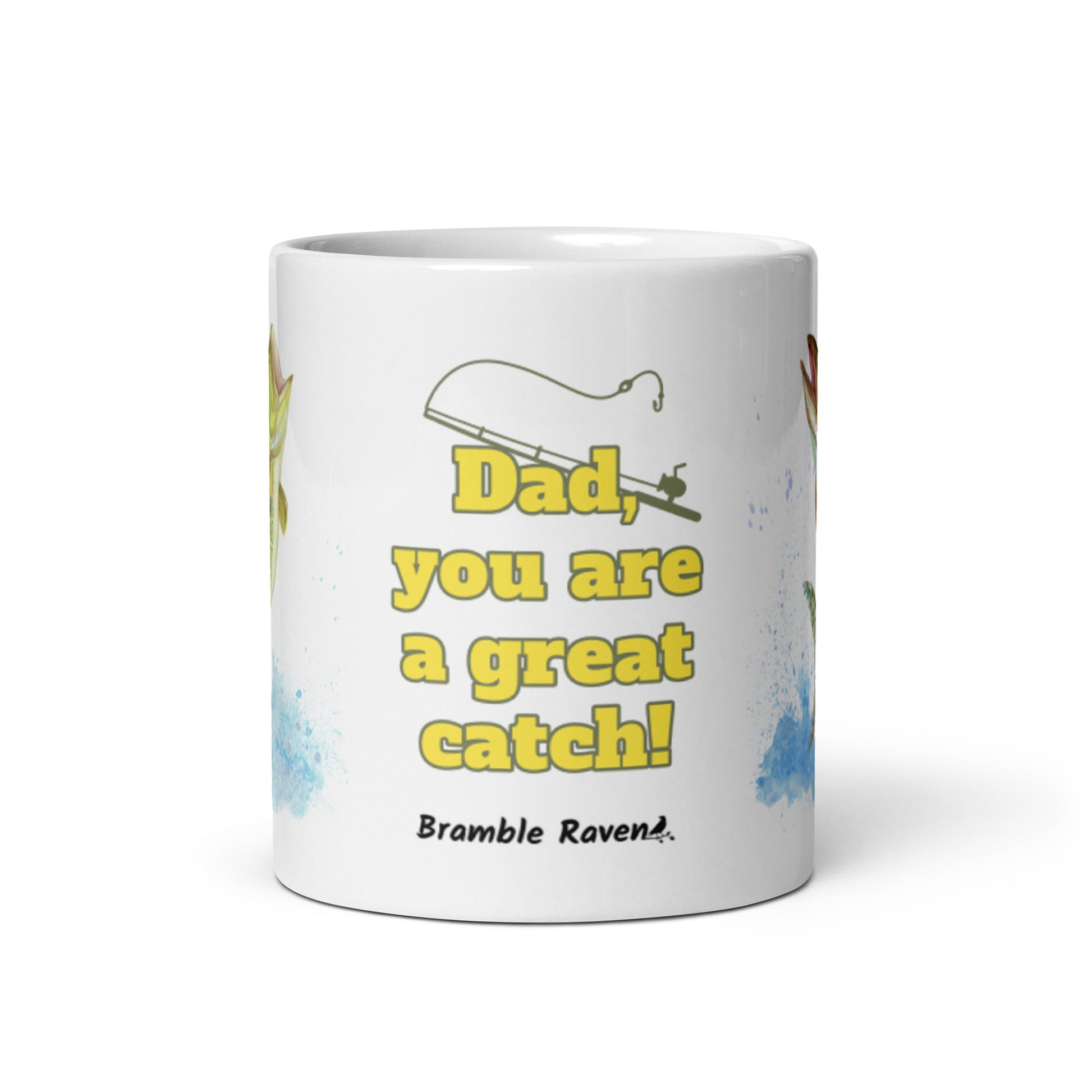 11 ounce ceramic mug. Features watercolor print of a rainbow trout and a largemouth bass with text that says: Dad, you are a great catch!