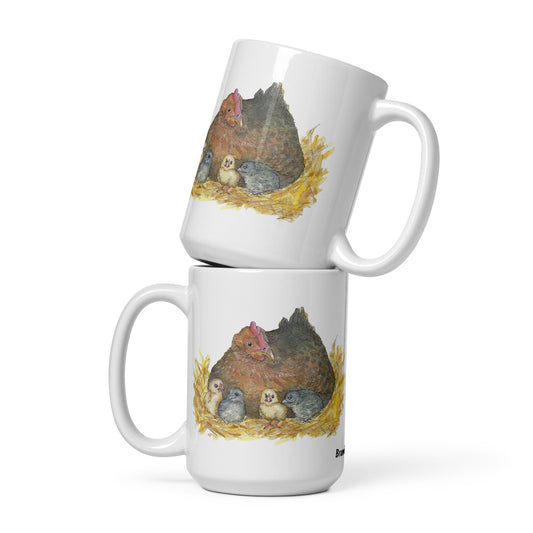 15 ounce white ceramic mug. Features double-sided print of a watercolor mother hen and chicks. Dishwasher and microwave safe.