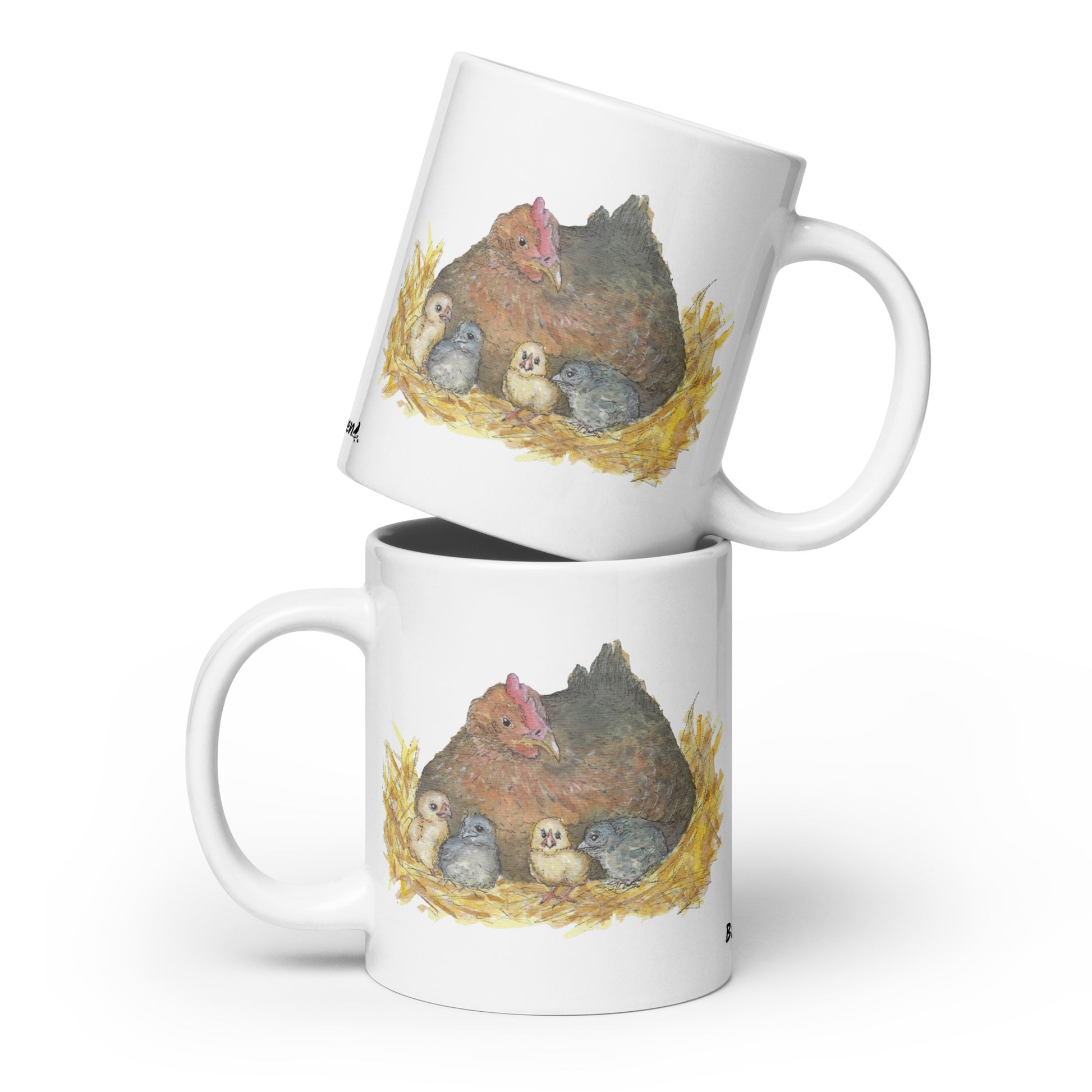 20 ounce white ceramic mug. Features double-sided print of a watercolor mother hen and chicks. Dishwasher and microwave safe.
