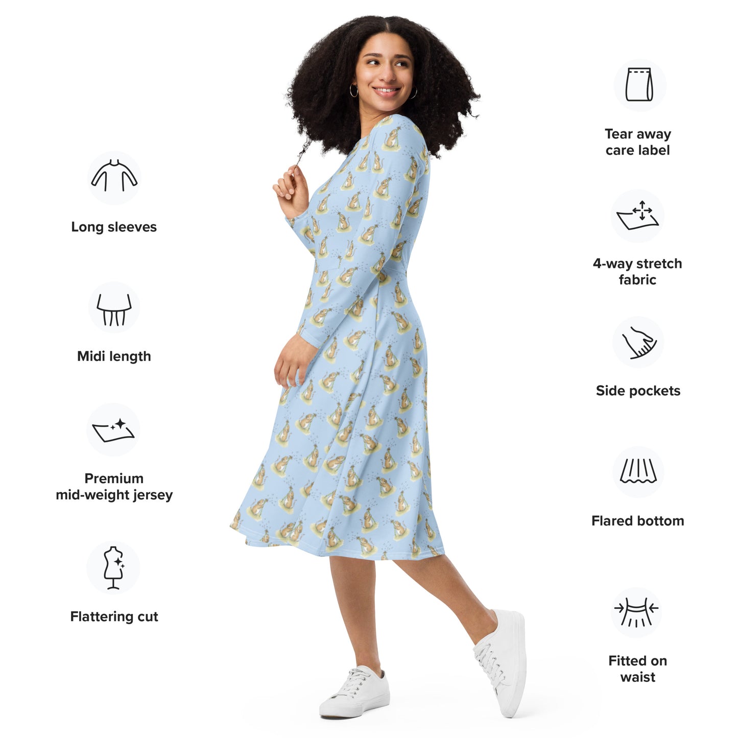 Dandelion Wish patterned long sleeve midi dress. Features patterned design of a mouse making a wish on a dandelion fluff against a light blue background. Dress has boat neckline, fitted waist, flared bottom, and side pockets.  Shown on female model facing left.