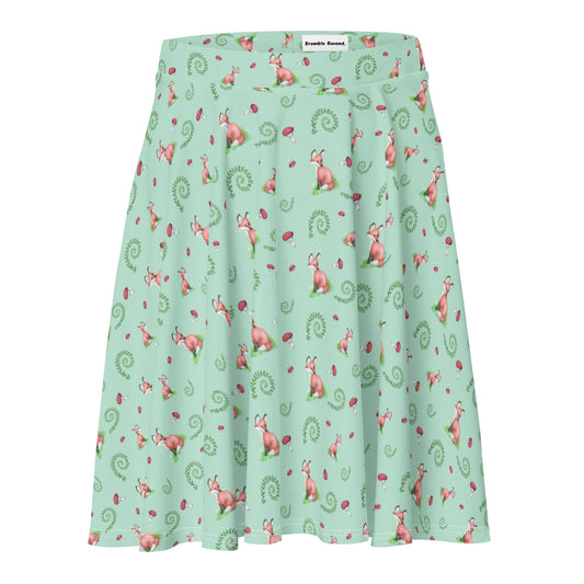 Forest Fox patterned skater skirt with mushrooms and ferns. Flared cut, mid-thigh length with elastic waist.