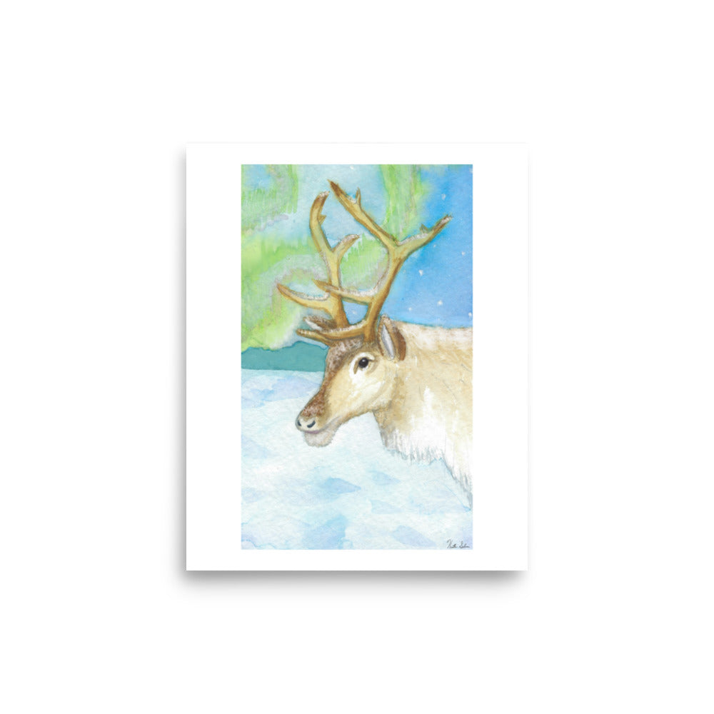 8 by 10 inch art poster print. Watercolor painting of a snowy reindeer with the northern lights in the background.