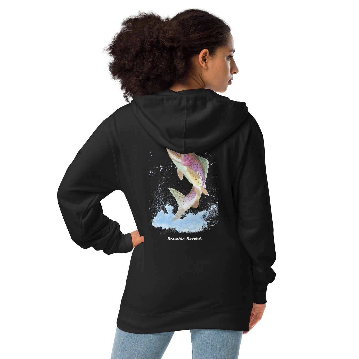 Unisex black colored fleece-lined zip-up hoodie. Features original watercolor painting of a rainbow trout leaping from the water on the back of the hoodie. Shown on a female model.