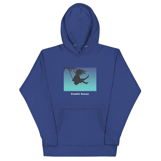 Original Swing Free design of a girl's silhouette in a tree swing against the backdrop of a blue starry sky. Rectangular image on the front of a unisex royal blue colored hoodie.