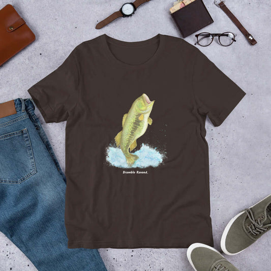Unisex brown colored t-shirt. Features a watercolor painting of a largemouth bass leaping out of the water.