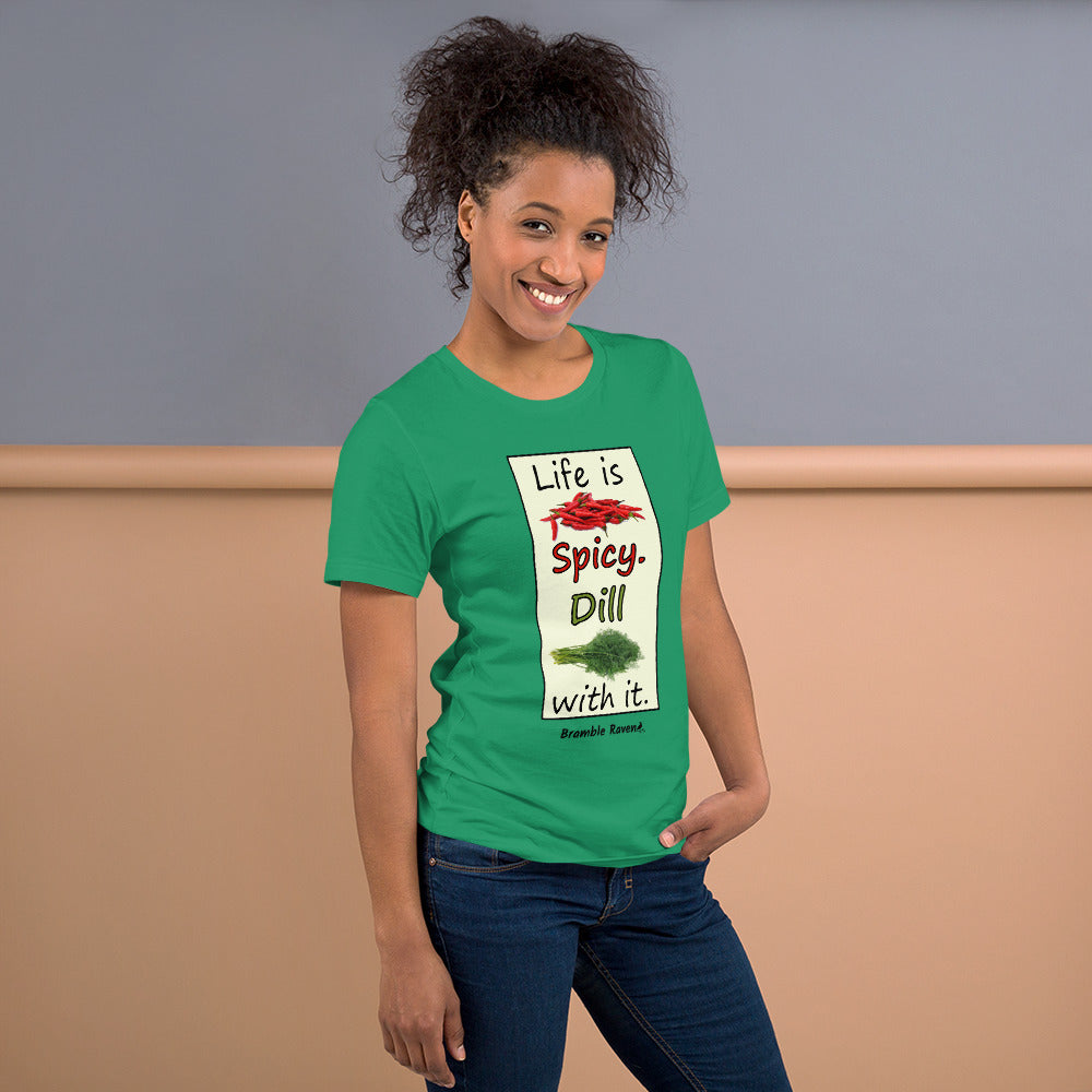 Life is spicy. Dill with it. Phrase with images of chili peppers and dill weed. Rectangular frame for saying on kelly green colored unisex t-shirt. Shown on female model.