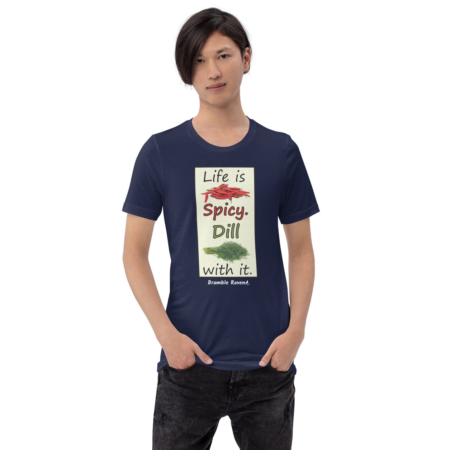 Life is spicy. Dill with it. Phrase with images of chili peppers and dill weed. Rectangular frame for saying on navy blue colored unisex t-shirt. Shown on male model.