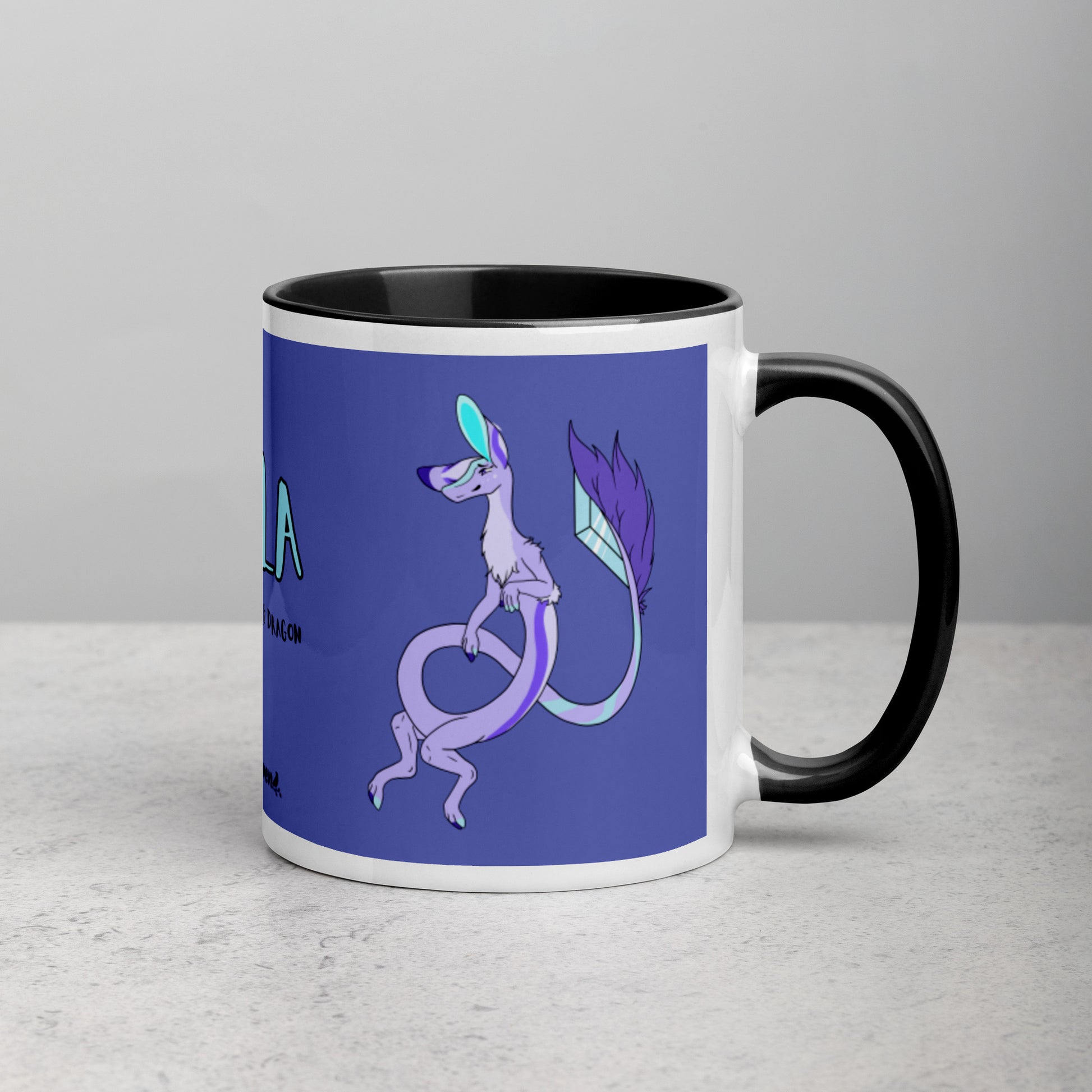 11 ounce white ceramic mug. Black inside and handle. Features double-sided image of Layla the Lavender Fuzzy Noodle Dragon. Shown on tabletop with handle facing right.