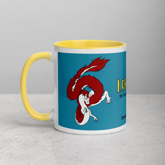11 ounce ceramic mug with yellow handle, rim and inside color. Features double-sided image of Loraina the Fuzzy Noodle Dragon on a dark blue background. Mug is microwave and dishwasher safe.