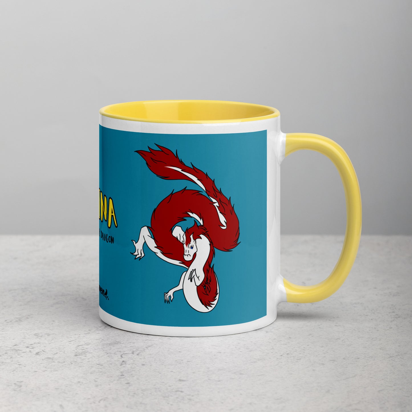 11 ounce ceramic mug with yellow handle, rim and inside color. Features double-sided image of Loraina the Fuzzy Noodle Dragon on a dark blue background. Mug is microwave and dishwasher safe.